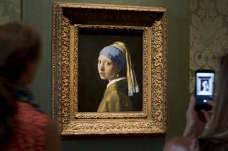Vermeer s Girl with a Pearl Earring back on display AP News
